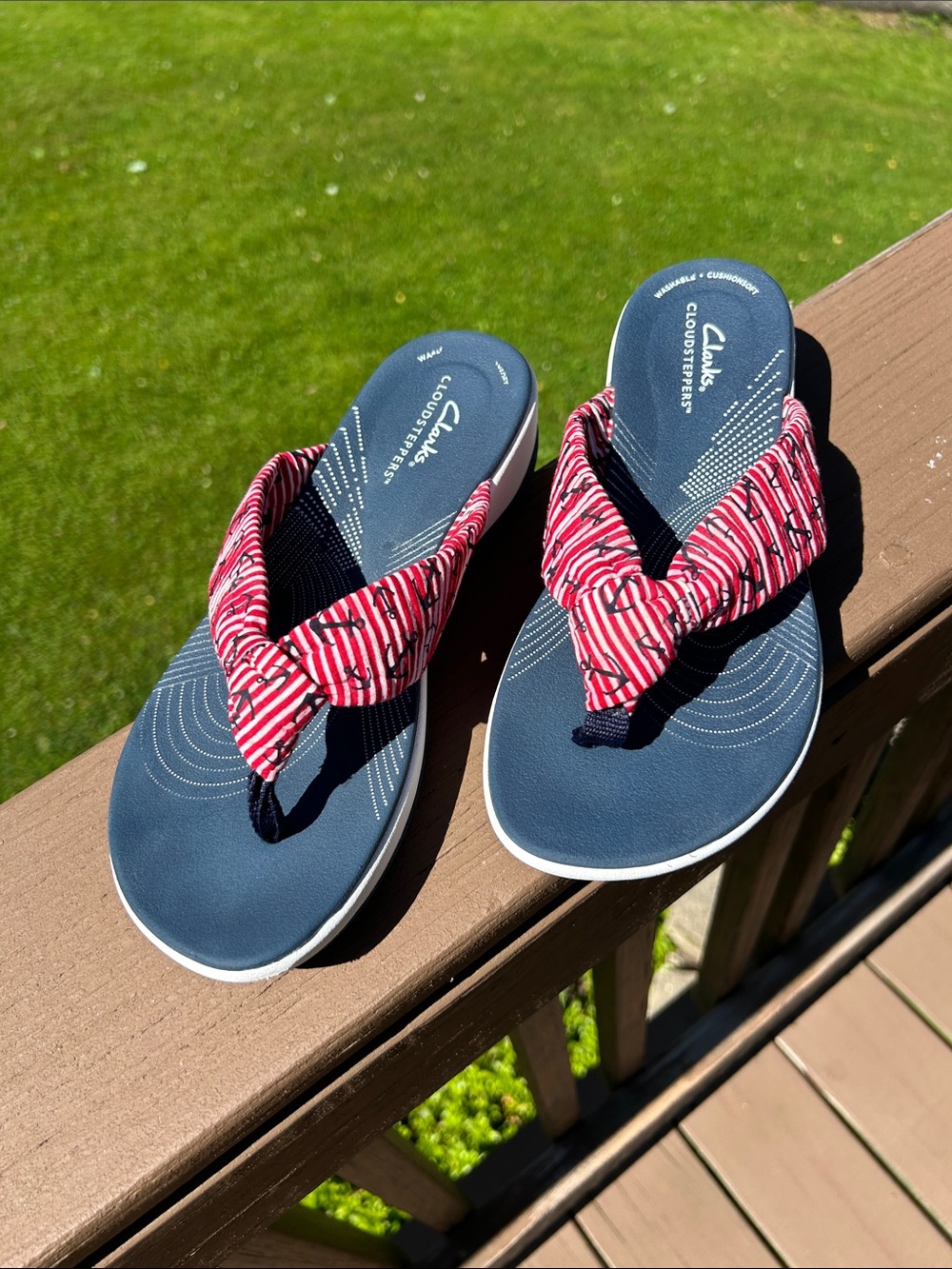 Clarks Navy Flip Flops with Red Striped Fabric Knotted Straps
